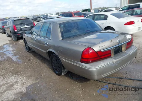 2005 Mercury Grand Marquis из США, поврежденный, VIN 2MHFM75W35X647751